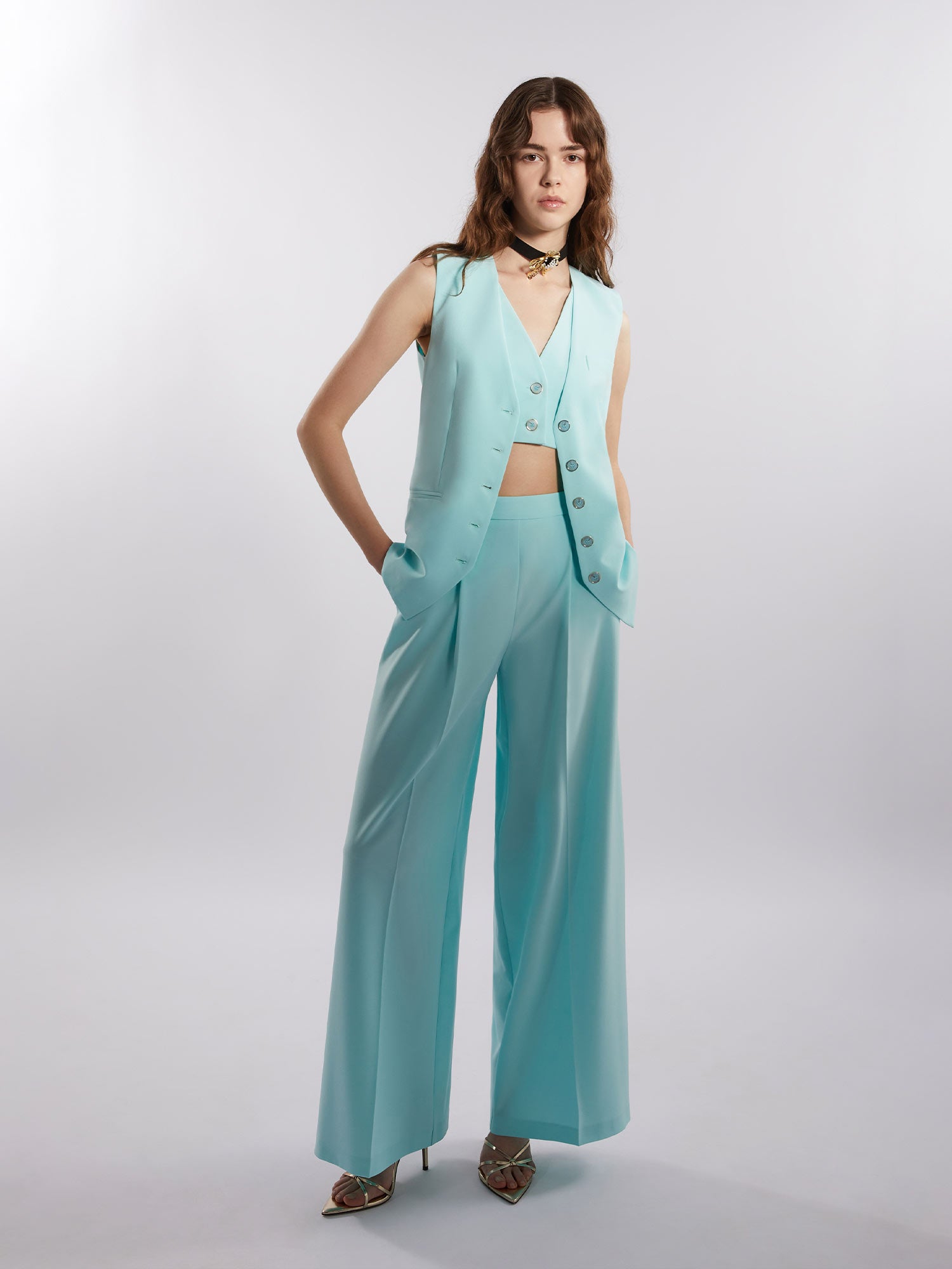 Wide-leg trousers with inverted pleat in fluid fabric